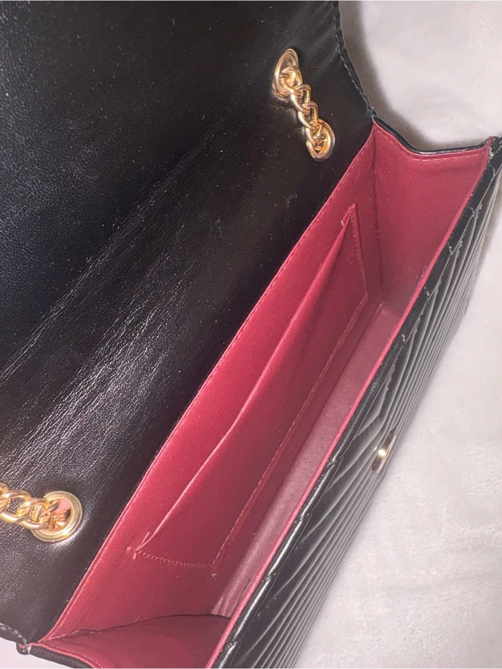 Black Quilted Shoulder Bag with Gold Chain and Logo Hardware